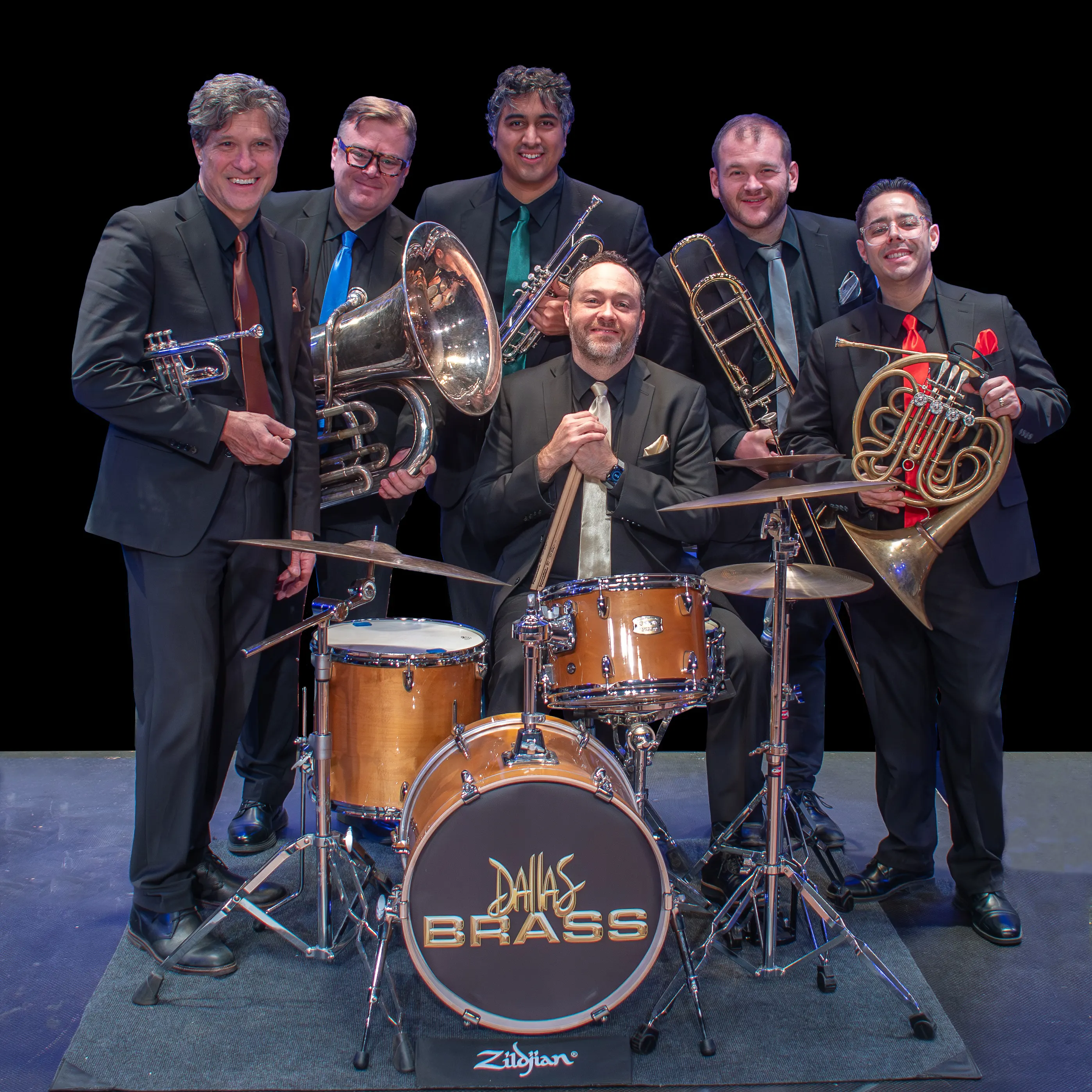 Features brass instruments with a full complement of drums and percussion covering classical masterpieces, Broadway, Hollywood and American music.